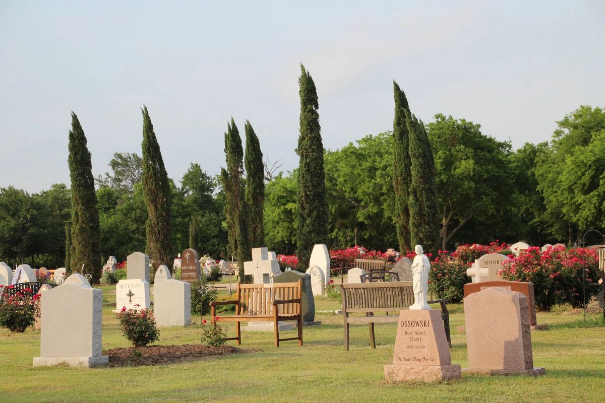 Families gathered for All Souls' Day at the cemetery